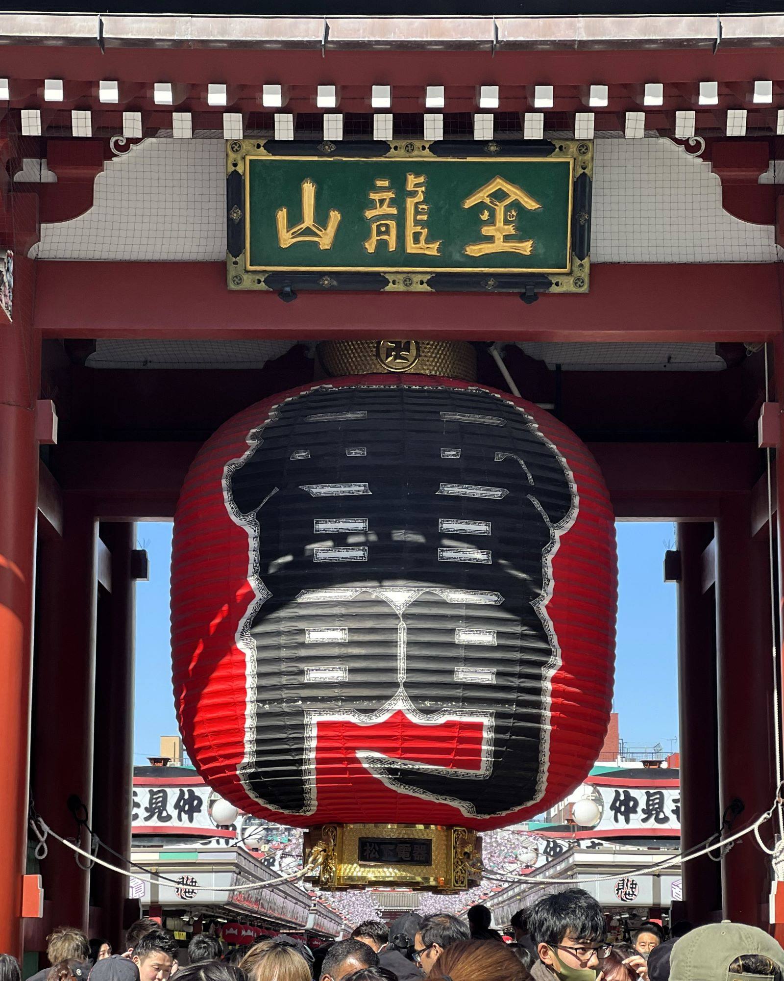 Iconic giant red paper lantern hanging at Kaminarimon Gate, the outer entrance to Sensō-ji Temple in Asakusa, Tokyo, Japan.